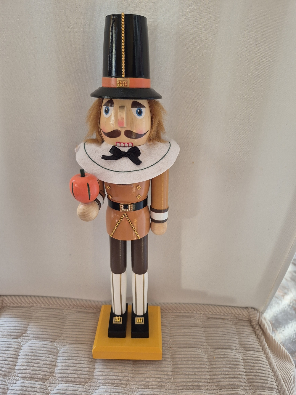 Wooden Pilgrim Nutcracker with Orange Hat and Apple